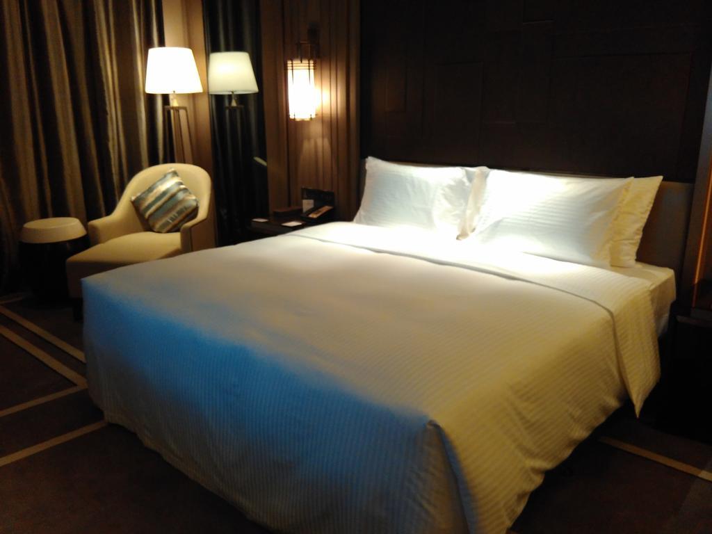 Wanda Realm Hotel Dongying Bagian luar foto