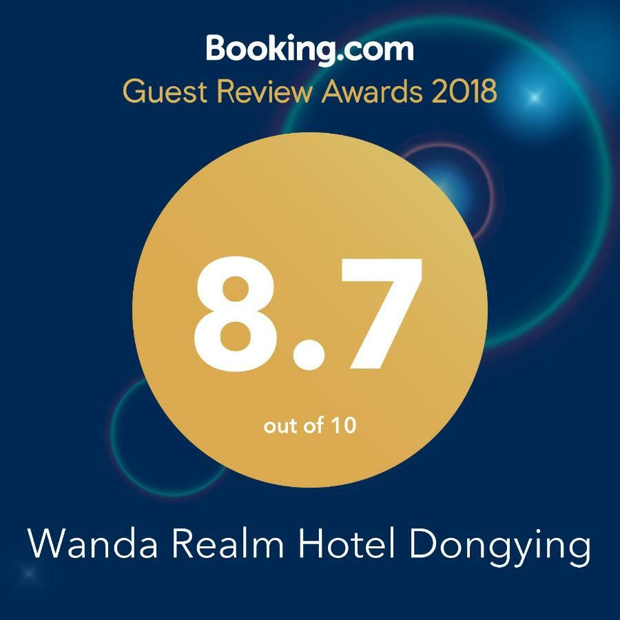 Wanda Realm Hotel Dongying Bagian luar foto
