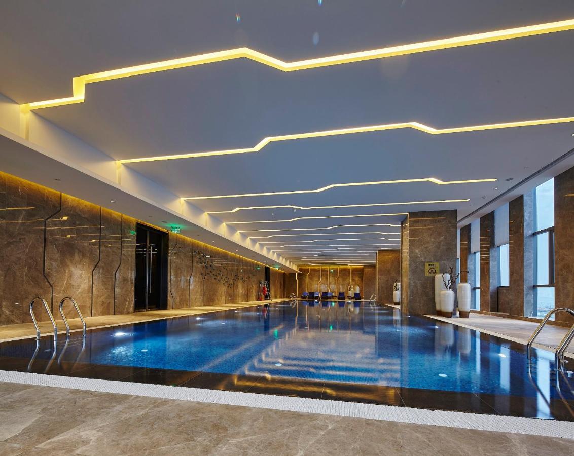 Wanda Realm Hotel Dongying Bagian luar foto